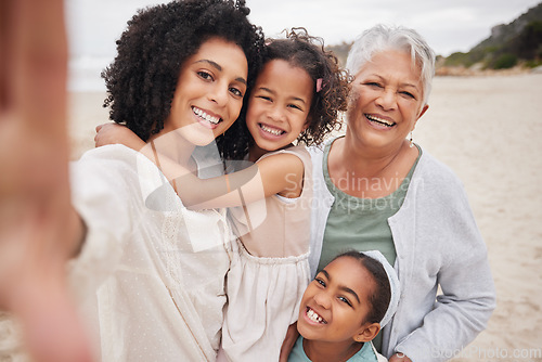 Image of Beach selfie, grandma or mom with happy kids in nature on family holiday vacation taking photograph. Portrait, social media or senior mother at sea with woman, kid or girls to relax or bond together