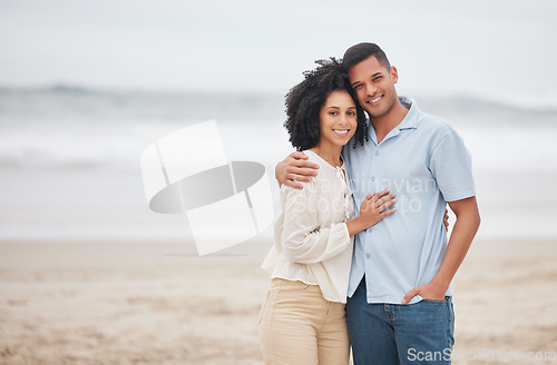 Image of Couple, hug and portrait on beach, smile and love in marriage, getaway and holiday for bonding. Mexican people, happy and relax at ocean or sea, vacation and travel or trip, summer and peace by waves