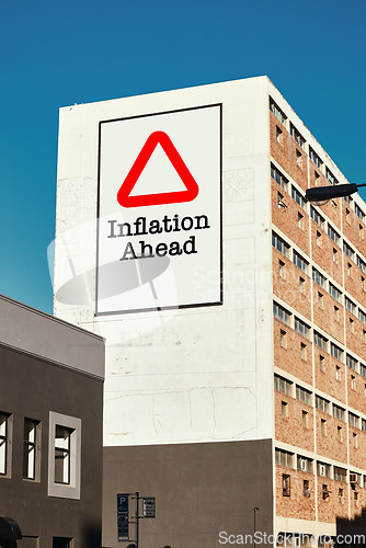 Image of City, building and warning of inflation, caution and price increase, cost or expenses. Economy recession, apartment billboard and banner in urban town for finance crisis, problem or advertising sign