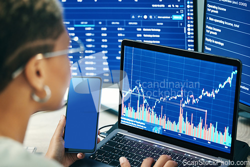 Image of Woman with phone, laptop screen and crypto data for research, investment and cyber stocks with mockup. Nft, financial management and developer with software for online profit stats, graphs or charts.