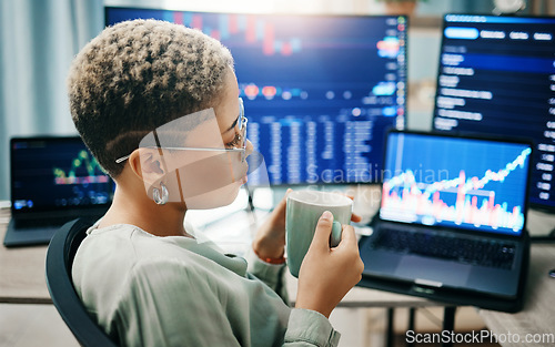 Image of Trading, woman and coffee with investment, laptop and stock market with research, connection and internet. Person, investor or employee with a pc, economy or code with website information or espresso
