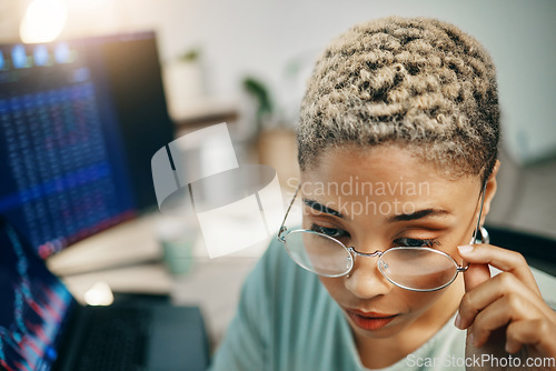 Image of Woman with glasses, thinking at computer and cyber security for crypto trading, online profit or analytics. Research, digital stocks and girl at desk with graphs, charts and software for investment.