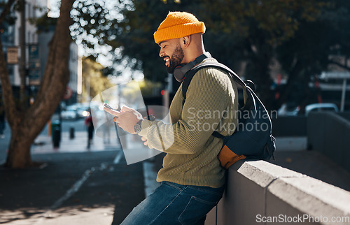 Image of City, typing and black man with a smartphone, smile and connection with social media, digital app and internet. African person, mobile user and guy with cellphone, website info and outdoor with ideas