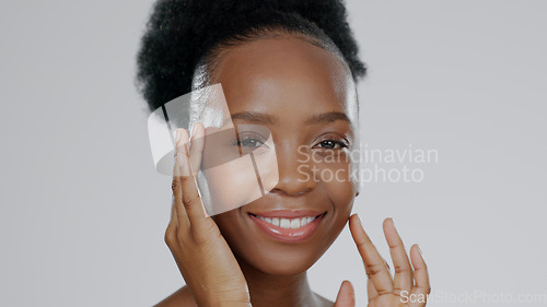 Image of Face touch, skincare and happy black woman in studio isolated on gray background mockup space. Portrait, hands and natural cosmetics of African model in spa facial treatment, wellness or aesthetic