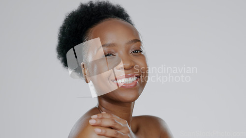 Image of Face, skincare and beauty of happy black woman in studio isolated on a gray background mockup space. Portrait, natural cosmetics and African model in spa facial treatment, wellness and skin health