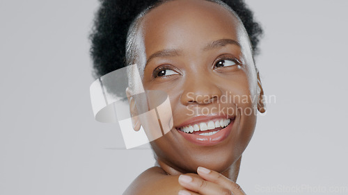 Image of Face, skincare and beauty of black woman thinking in studio isolated on a gray background mockup space. Portrait, natural cosmetics and happy African model in spa facial treatment, wellness or health