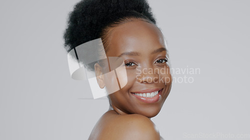 Image of Face, skincare and beauty of happy black woman in studio isolated on a gray background mockup space. Portrait, natural cosmetics and African model in spa facial treatment, wellness and skin health