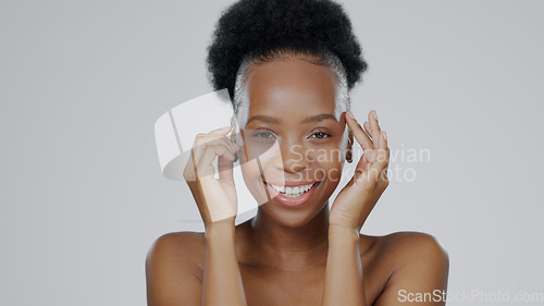 Image of Face, skincare and hands of happy black woman in studio isolated on gray background for dermatology. Portrait, touch and natural beauty cosmetics of model in spa facial treatment, wellness or health