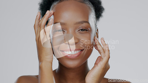 Image of Face touch, skincare and beauty of black woman in studio isolated on gray background for dermatology. Portrait, hands and natural cosmetics of happy model in spa facial treatment, wellness or health