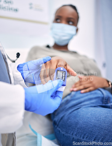 Image of Healthcare, diabetes and woman with doctor for glucose test, sugar level and high blood pressure. Hospital, digital monitor and patient with health worker for hypertension, wellness and consultation