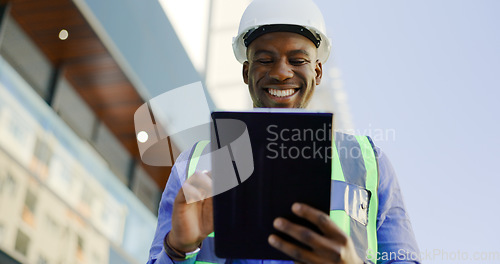 Image of Engineering, man and tablet at construction site inspection, building development and industrial renovation. Excited or happy african worker on digital tech, design software or architecture planning