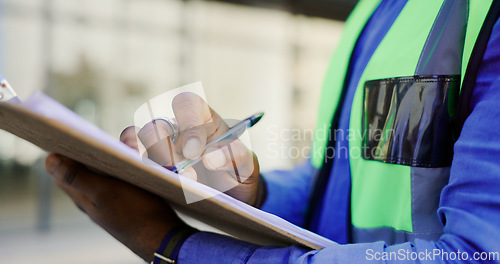 Image of Hands, clipboard and person in construction, writing and inspection, architect or contractor at maintenance job. Assessment, review and check blueprint for architecture project for quality assurance