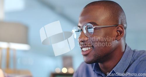 Image of Reading, research and professional businessman in the office planning legal project with deadline. Focus, glasses and professional African male attorney working on a law case in workplace at night.