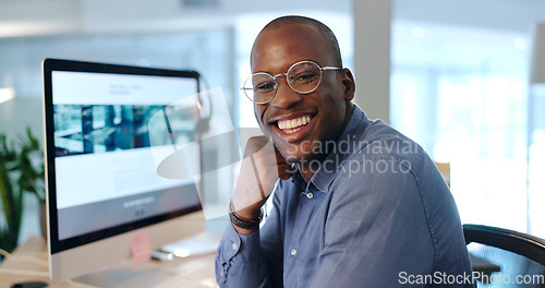 Image of African man, portrait and computer in office at investing agency with smile for pride, finance or knowledge. Happy trader, excited face and black business owner in workplace, research or stock market