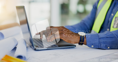 Image of Hands, laptop and person in construction or architect working on floor plan, contractor and maintenance job. Typing, digital blueprint for architecture project and productivity with design software