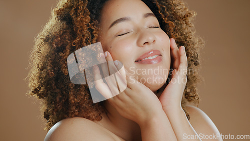 Image of Happy model, natural beauty or cosmetics for wellness in studio with smile, eyes closed or skin glow. Relax, proud girl or confident biracial female person with skincare results on brown background