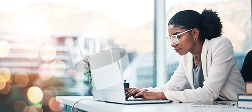 Image of Businesswoman, laptop and typing a proposal in corporate office, agenda and report or schedule. African person, research and review or email via internet, digital and technology with bokeh in mockup