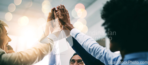 Image of Closeup, high five and business people with support, hands and collaboration with mission, achievement or cooperation. Staff, group or corporate professionals with teamwork, bokeh or celebration