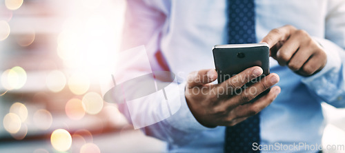 Image of Businessman, phone and hands typing for communication or networking on bokeh background at office. Closeup of man on mobile smartphone app for online texting, chatting or social media and research