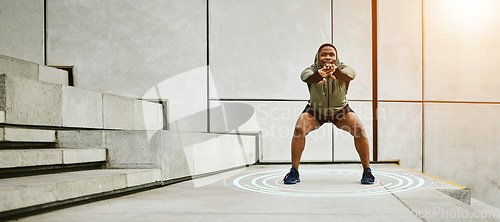 Image of Fitness, target and flare with a man stretching on stairs in the city for the start of his workout routine. Exercise, warm up and special effects with a young african athlete in an urban town