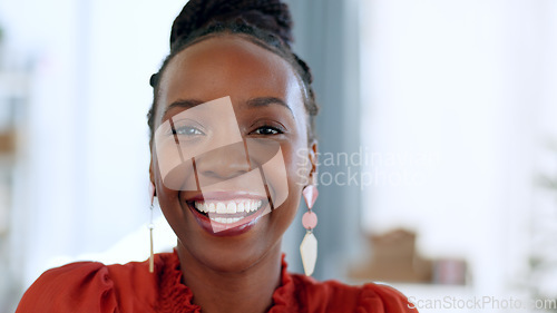 Image of Portrait, smile and a business black woman closeup in the office of her small business boutique. Face, fashion and a happy young employee or entrepreneur in her professional workplace for design