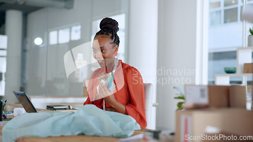 Image of African woman, designer and video call for fashion review, fabric decision and laptop for questions in workshop. Tailor, black business owner and textile for pattern, cloth or choice with creativity