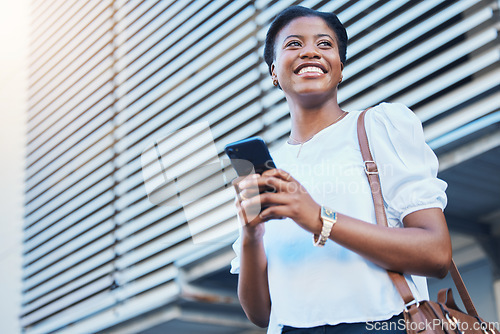 Image of Phone, smile and young woman in the city networking on social media, mobile app or the internet. Happy, technology and African female person scroll on cellphone and walking in urban town street.