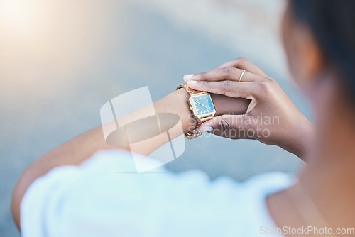 Image of Closeup, woman and arm with watch for time management with elegance for business meeting in city. African person, entrepreneur and waiting by delay, check or late for transport to commute to client