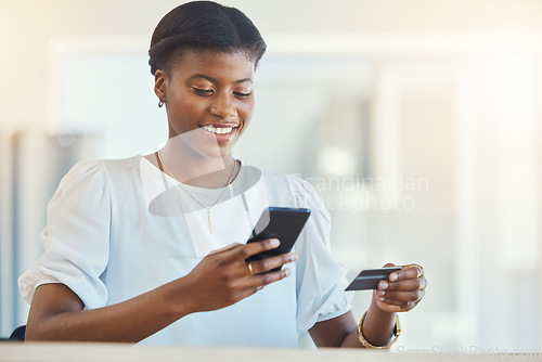 Image of Black woman, business credit card and smartphone, online shopping and fintech with smile, payment and finance. Corporate account, using phone for mobile banking and app, happy worker with e commerce