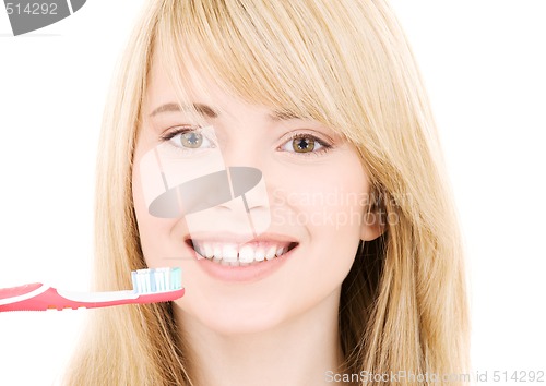 Image of happy girl with toothbrush