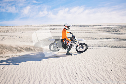 Image of Desert dust, motorbike and man outdoor for extreme sports, adventure and travel. Off road, sand and driver on motorcycle on dirt track in nature for action, competition race and riding for freedom