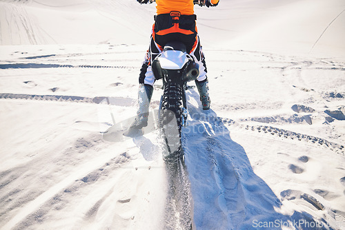 Image of Motorcycle, sand and person in desert for sports, exercise and training for race, challenge and competition. Extreme sport, nature and cyclist on motorbike for freedom, adventure and adrenaline