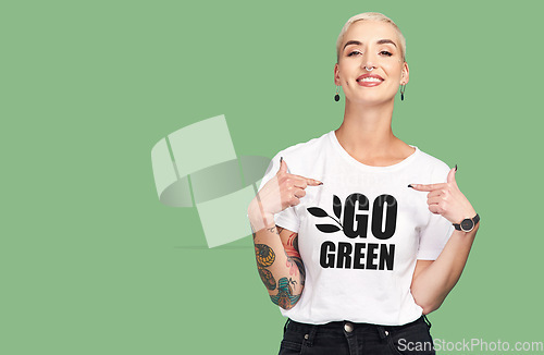 Image of Mockup, sustainable fashion and green background, woman with tshirt and space for eco friendly product placement. Sustainability, fashion and climate change influencer with smile and cotton clothes.