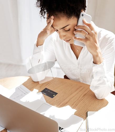 Image of Black woman, phone call and credit card for debt, frustrated with bills and at desk with laptop. African American female, upset lady or cellphone for connection, communication or payment query stress