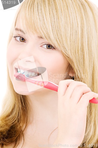 Image of happy girl with toothbrush