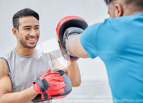 Image of Personal trainer, man boxer and training for boxing match, cardio fighting workout and punching exercise. Fitness coach, sport motivation and men learning to fight for competition tournament outdoors