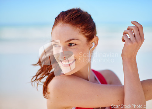 Image of Young woman, stretching and beach for exercise, fitness and body care for health, calm and relax outdoor. Healthy female, girl athlete or training for balance, calm and wellness for cardio or seaside