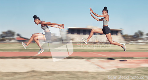 Image of Time lapse, long jump and woman running, jumping and cross in sand pit for fitness, training and exercise. Sequence, jump and black woman leap, fit and workout, energy and sports practice at stadium