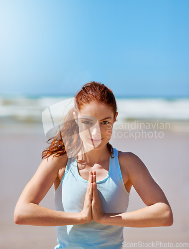 Image of Yoga, meditation and woman portrait on the beach with zen fitness, wellness and peace in nature. Summer ocean training with exercise, pilates and workout with freedom and holistic balance outdoor