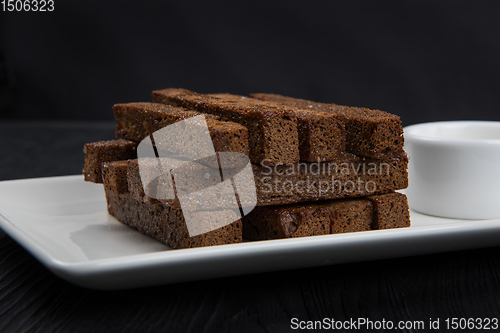 Image of Crackers with garlic from black bread