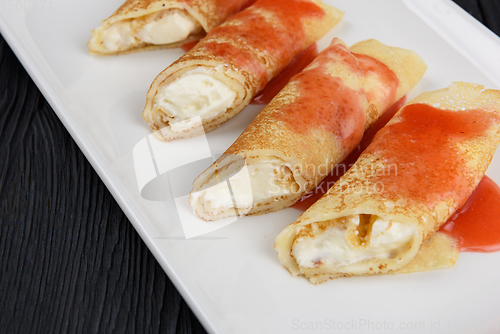 Image of Pancakes stuffed with cream