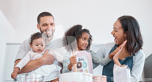 Image of Family, cooking and learning with high five for success from supportive mother in home kitchen. Teamwork, achievement and happy parents proud of baker skills of child mixing cake ingredients.