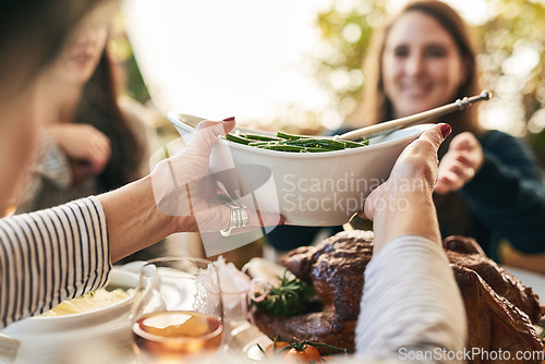 Image of Family hands, thanksgiving food and green beans salad in holiday celebration, social lunch or dinner gathering in house, home or restaurant. Zoom, woman or festive friends sharing vegetables and meat