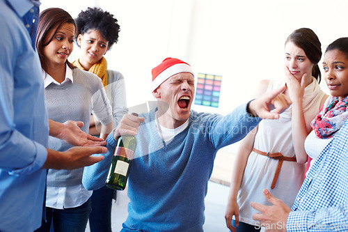 Image of Bad, office and party with business team looking uncomfortable by colleague drunk behaviour in office. Business people, judging and confused by alcoholic employee being silly at their work event