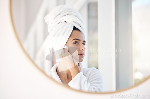 Image of Mirror, skincare woman in bathroom for cleaning, facial and skin product or cotton in her home with mockup. Face, beauty and girl with hydration cosmetic treatment after shower, hygiene and grooming