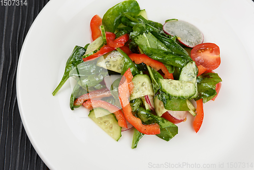 Image of Vegetable salad on white plate