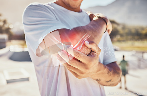 Image of Man, joint pain and elbow arthritis in outdoor closeup in summer sunshine with massage arms. Broken arm, bone and guy at urban park in metro, city or town with physical therapy with hands in zoom