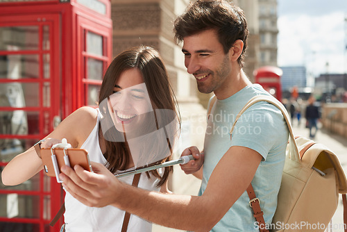 Image of Travel, selfie and couple in London city on smartphone, social media, networking and influencer lifestyle update. Blog digital friends in Big Ben using phone, live streaming uk vacation trip together