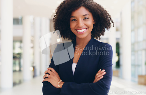 Image of Corporate woman, portrait and leader smile in office with arms crossed. Business manager, happy ceo and startup leadership motivation in modern workplace or black woman entrepreneurship empowerment