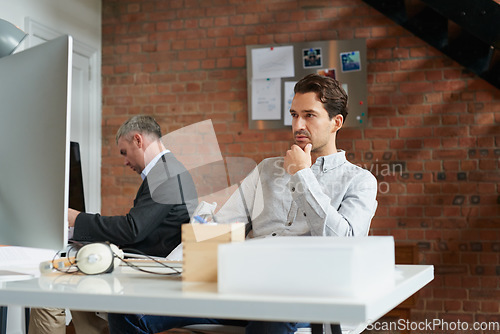 Image of Young businessman, office employee at desk and man thinking of strategy, business solution and marketing idea in advertising agency. Corporate consulting firm, CRM consultant and company professional